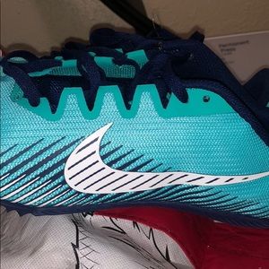 Nike racing multi use sneakers size 12 ladies